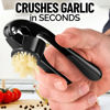 Picture of Zulay Kitchen Premium Garlic Press Set - Rust Proof & Dishwasher Safe Professional Garlic Mincer Tool - Easy-Squeeze, Easy-Clean with Soft, Ergonomic Handle - Silicone Garlic Peeler & Brush (Black)