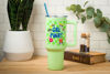 Picture of Silver Buffalo Powerpuff Girls Girl Power Groovy Retro Featuring Blossom, Bubbles, and Buttercup Stainless Steel Tumbler with Handle and Straw, Fits in Standard Cup Holder, 40 Ounces