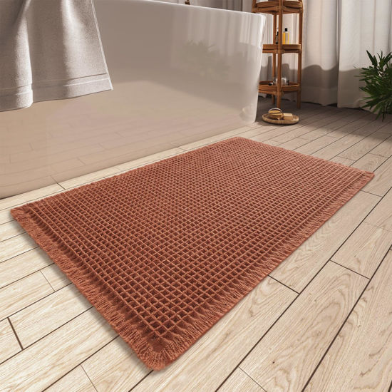 Picture of AMOAMI Upgraded Waffle Bath Mat, Super Absorbent Non Slip Bath Mats for Bathroom Floor, Machine Washable Bathroom Rugs with Tassels, Rubber Backed Bathroom Mats, Ultra Soft, 20" x 32", Dirty Orange
