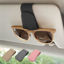 Picture of Ompellus 2 Pack Magnetic Leather Sunglass Holder, Eyeglass Hanger Clip for Car Sun Visor, Suitable for Different Size Eyeglasses(Black, 2 Pack)