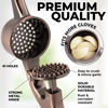 Picture of Zulay Kitchen Large Premium Garlic Press Set - Bigger Bowl for Bigger Garlic - Rust Proof & Dishwasher Safe Garlic Mincer Tool - Easy-Squeeze, Easy-Clean Silicone Garlic Peeler & Brush (Copper)