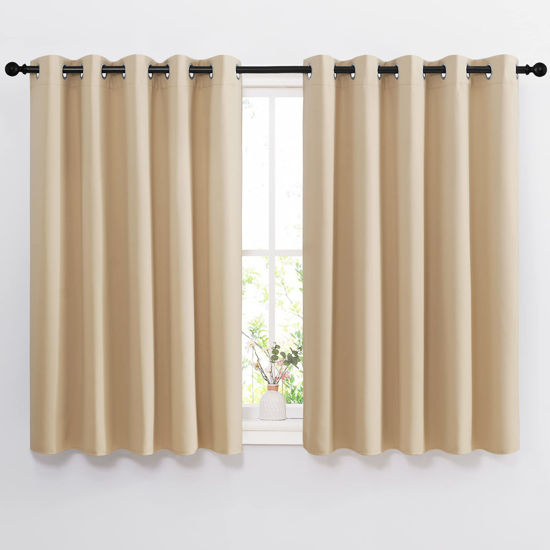 Picture of NICETOWN Bedroom Blackout Curtains and Drapes - Window Treatment Thermal Insulated Solid Grommet Blackout Draperies for Bedroom (Biscotti Beige, Set of 2, 66 by 54 Inch)