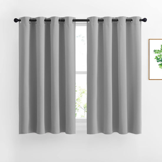 Picture of NICETOWN Bedroom Blackout Curtains Panels - Window Treatment Thermal Insulated Solid Grommet Vertical Drapes for Nursery (1 Pair, 52 by 54 Inch, Silver Grey)