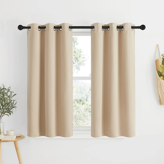 Picture of NICETOWN Bedroom Blackout Curtains and Drapes - Window Treatment Thermal Insulated Solid Grommet Blackout Draperies for Kitchen/Cafe (Biscotti Beige, Set of 2, 34 by 50 Inch)