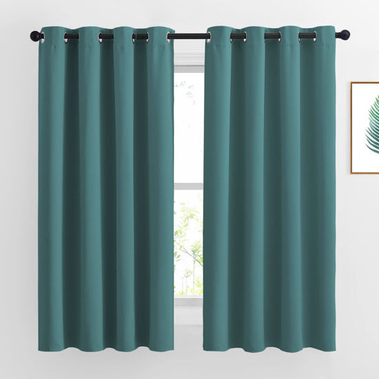 Picture of NICETOWN Blackout Curtains for Kids Room - Triple Weave Microfiber Home Thermal Insulated Solid Ring Top Blackout Panels/Drapes for Bedroom(Sea Teal, Set of 2, 52 x 63 Inch)