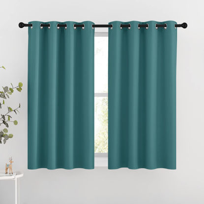 Picture of NICETOWN Blackout Curtains for Kids Room - Triple Weave Microfiber Home Thermal Insulated Solid Ring Top Blackout Panels/Drapes for Bedroom(Sea Teal, Set of 2, 46 x 54 Inch)