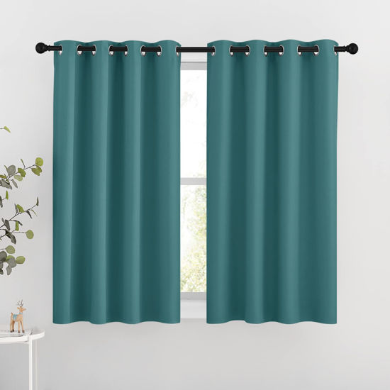Picture of NICETOWN Blackout Curtains for Kids Room - Triple Weave Microfiber Home Thermal Insulated Solid Ring Top Blackout Panels/Drapes for Bedroom(Sea Teal, Set of 2, 46 x 54 Inch)