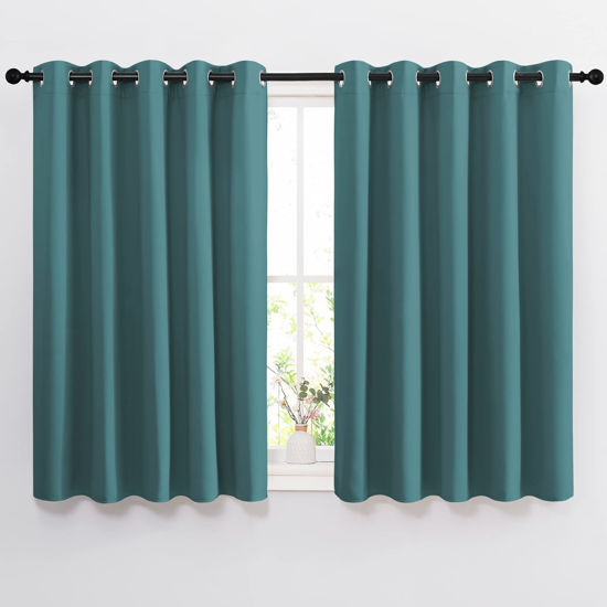 Picture of NICETOWN Blackout Curtains for Kids Room - Triple Weave Microfiber Home Thermal Insulated Solid Ring Top Blackout Panels/Drapes for Bedroom(Sea Teal, Set of 2, 66 x 54 Inch)