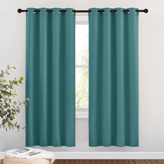Picture of NICETOWN Insulated Curtains Blackout Draperies - Triple Weave Microfiber Home Thermal Insulated Solid Ring Top Blackout Curtains/Panels for Bedroom(Sea Teal, Set of 2, 46 x 72 Inch)