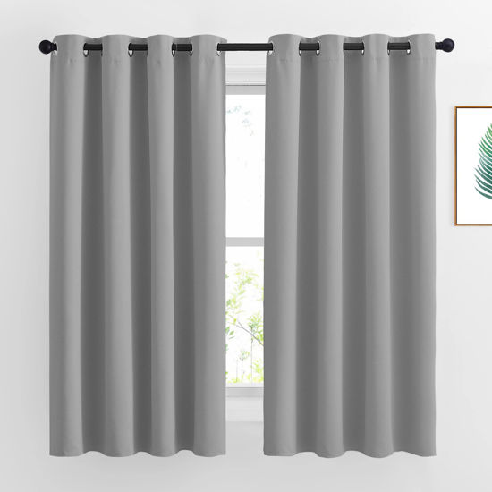 Picture of NICETOWN Bedroom Blackout Curtains Panels - Window Treatment Thermal Insulated Solid Grommet Room Darkening Drapes for Living Room (Set of 2 Panels, 52 by 63 Inch, Silver Grey)