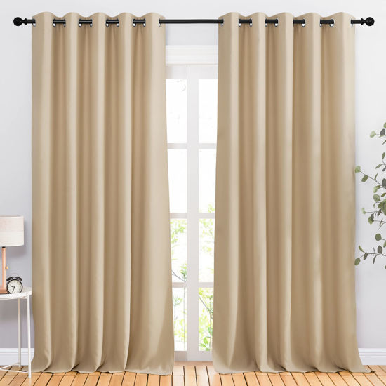 Picture of NICETOWN Blackout Draperies Curtains Panels - Window Treatment Thermal Insulated Solid Grommet Blackout Curtains/Panels/Drapes for Bedroom (Biscotti Beige, Set of 2, 66 by 90 Inch)