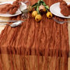 Picture of MLMC 12 Pack Fall Table Runner Terracotta Cheesecloth Table Runner 10ft Wrinkled Rustic Burnt Orange Cheese Cloth Table Runner for Thanksgiving Friendsgiving Home Party Decor