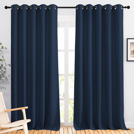Picture of NICETOWN Blackout Curtain Panels 90 - Window Treatment Energy Saving Thermal Insulated Solid Grommet Blackout Drapes for Living Room (Navy, 1 Pair, 66 by 90-Inch)
