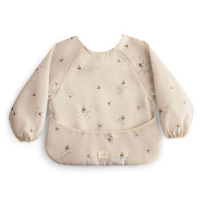 Picture of mushie Long Sleeve Baby Bib | Mess Free & Waterproof Fabric for Toddlers | Adjustable Fit for Ages 6-24 Months (Boats)