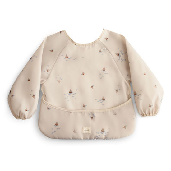 Picture of mushie Long Sleeve Baby Bib | Mess Free & Waterproof Fabric for Toddlers | Adjustable Fit for Ages 6-24 Months (Boats)