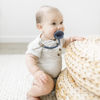 Picture of Ryan & Rose Cutie PAT All-in-One Pacifier and Teether Massaging Teething Ring and Hideaway Binky for Growing Babies (Prep (3 Pack), Flat)