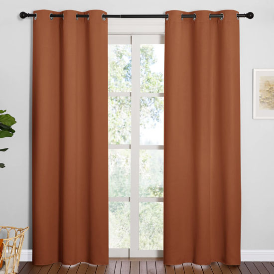 Picture of NICETOWN Nursery Essential Thermal Insulated Solid Grommet Top Blackout Curtains/Drapes for Halloween Decorations (1 Pair, 42 x 84 inches in Burnt Orange)