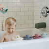 Picture of mushie Bath Spout Cover | Soft Silicone Bathtub Faucet Safety Guard for Kids | Universal Fit (Dried Thyme)