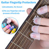 Picture of 20 Pcs Guitar Fingertip Protectors Guitar Finger Guards Protection Guitar Silicone Covers Caps for Guitar Bass Ukulele With 2 Pcs Guitar Fretboard Stickers And Guitar chord Chart