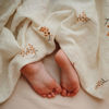 Picture of mushie Muslin Baby Swaddle Blanket | 100% Organic Cotton (Flowers)