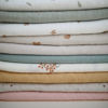 Picture of mushie Muslin Baby Swaddle Blanket | 100% Organic Cotton (Falling Stars)
