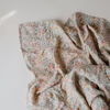 Picture of mushie Muslin Baby Swaddle Blanket | 100% Organic Cotton (Pastel Blooms)