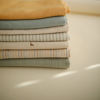 Picture of mushie Muslin Baby Swaddle Blanket | 100% Organic Cotton (Sage Stripe)