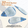 Picture of 32pcs Guitar Picks Grips, Large Silicone Soft Grips with 3 Guitar Picks, Resuable Anti slip and Self-Adhesive, Help You Holding the Guitar Picks Tightly