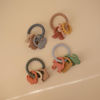 Picture of mushie Silicone Space Teething Ring Toy