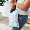 Picture of Bumkins Disney Waterproof Wet Dry Clutch Bag for Baby, Travel, Swim Suit, Cloth Diapers, Pump Parts, Pool, Gym Clothes, Toiletry, Strap to Stroller, Daycare, Zip Reusable Bag, Packing Pouch, Stitch