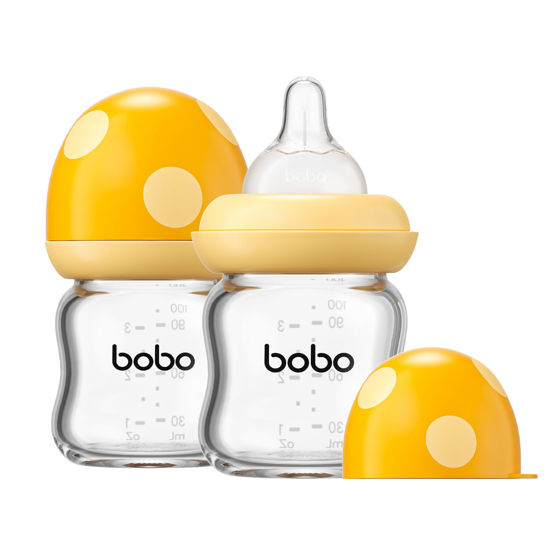 Picture of YOHKOH Natural Glass Baby Bottle with Natural Response Nipple, Newborn Anti-Colic Baby Bottles, Wide Neck Mushroom Cap Baby Bottle, Clear (Yellow, 3.4oz (Pack of 2))