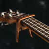 Picture of Ukulele Capo for Soprano, Concert, Tenor, Baritone Ukulele with felt picks (Walnut)