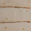 Picture of mushie Extra Soft Muslin Fitted Changing Pad Cover (Sun)