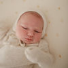 Picture of mushie Extra Soft Muslin Fitted Changing Pad Cover (Sun)