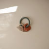 Picture of mushie Silicone Dino Teething Ring Toy
