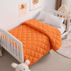 Picture of NTBAY Down Alternative Oversized Toddler Comforter, Super Soft and Warm Solid Color Baby Crib Quilted Blanket, 43x60 inches, Orange