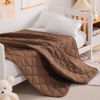Picture of NTBAY Down Alternative Toddler Comforter, Lightweight and Warm Solid Color Baby Crib Quilted Blanket, 39x47 inches, Brown